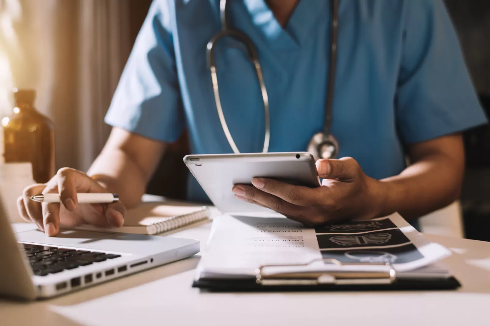 A doctor using a device